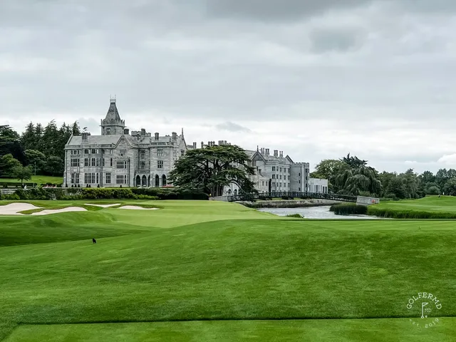 A golfer putting on a green at Adare Manor.