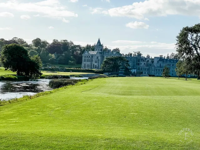 A fairway and green at Adare Manor, with a bunker in the foreground.