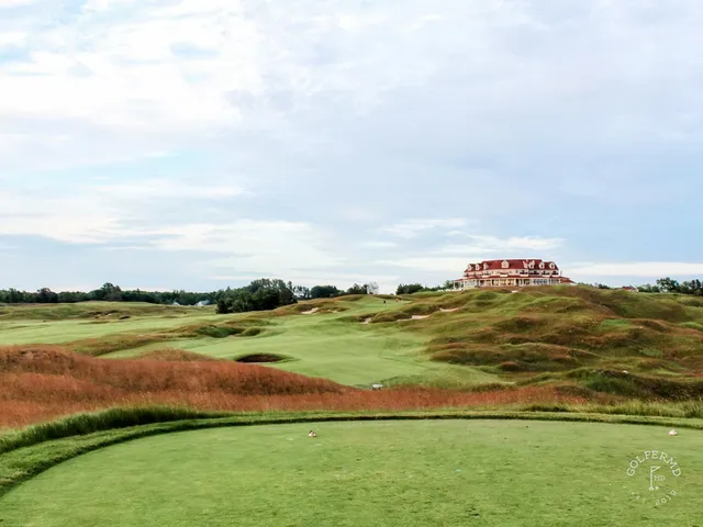 A wide view across Arcadia Bluffs, with the fairway dropping toward the lake.