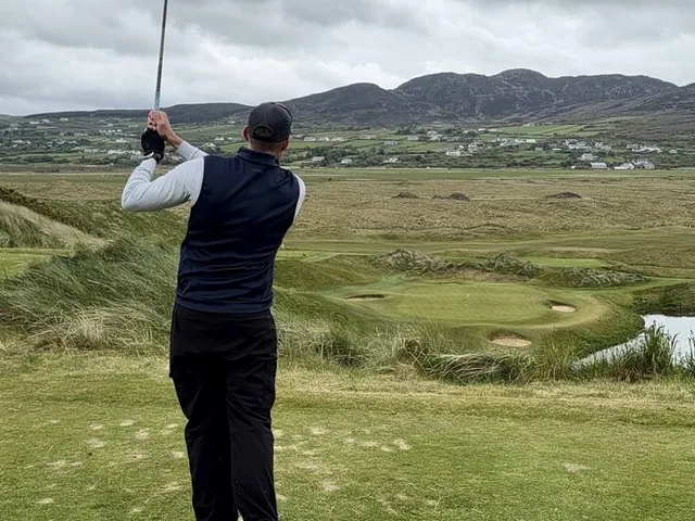 A wide view across the Glashedy Links, with fairway, dunes, and the ocean.