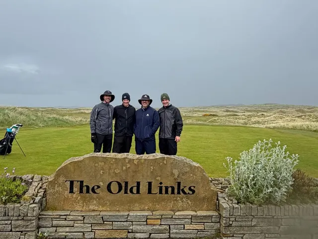 A wide view of the Old Links, with dunes and the Atlantic on the horizon.