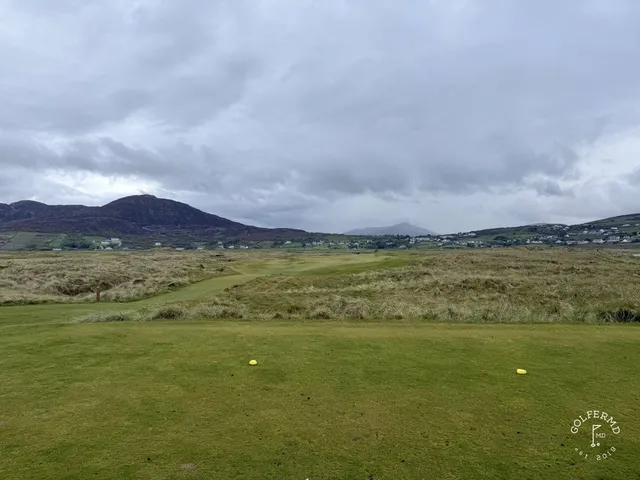 A green and flagstick on the Old Links above the dunes, with the Atlantic behind the hole.