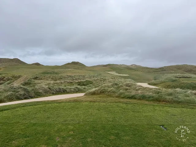 A fairway at Carne running through the dunes toward the Atlantic.