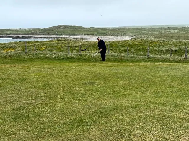 A wide hole at Carne, the fairway running toward the Atlantic.