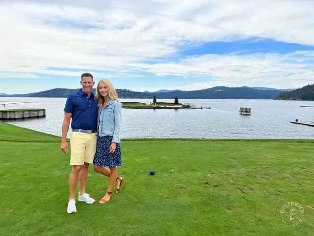 A wide view across the Coeur d'Alene Resort course, with pines and the lake.