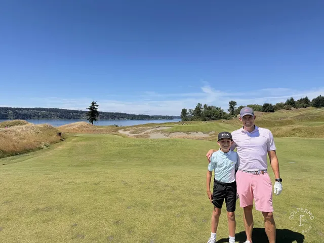 A fairway at Chambers Bay lined with beach grass, running toward the sound.