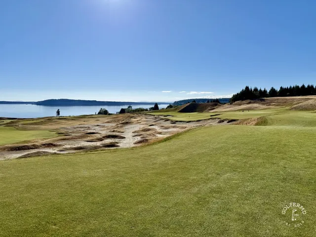 A wide view across the dunes at Chambers Bay, with the sound on the horizon.