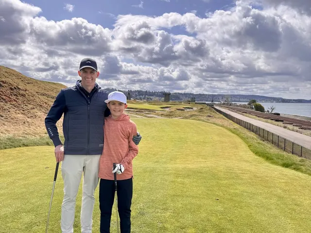 A last wide view across Chambers Bay, with the fairway, the dunes, and Puget Sound.