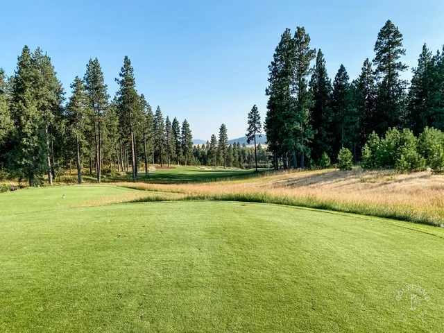 A fairway at Circling Raven with a waste bunker along one side.