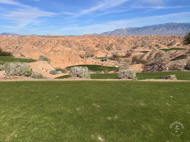 A fairway at Conestoga Golf Club running toward the desert mountains.