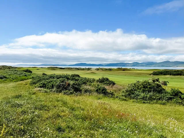A wide view at Dooks, with the dunes and Dingle Bay on the horizon.