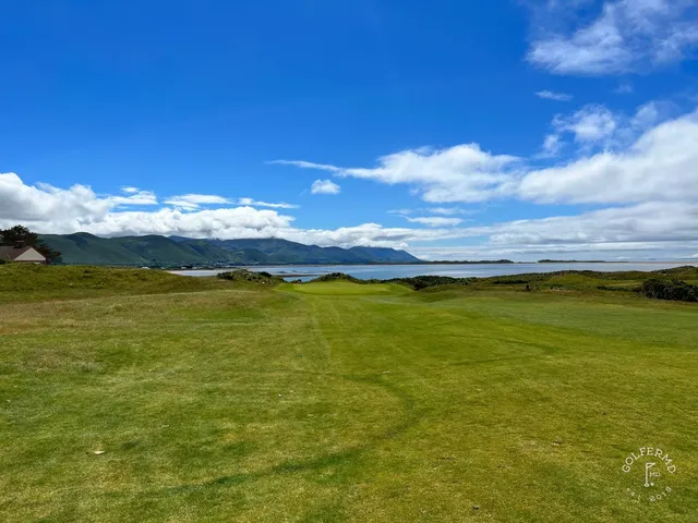 A last wide view across Dooks, with the fairway and Dingle Bay.