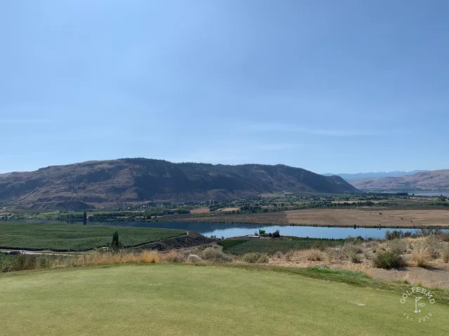 A wide hole at Gamble Sands, sandy waste along the fairway and the green in the distance.