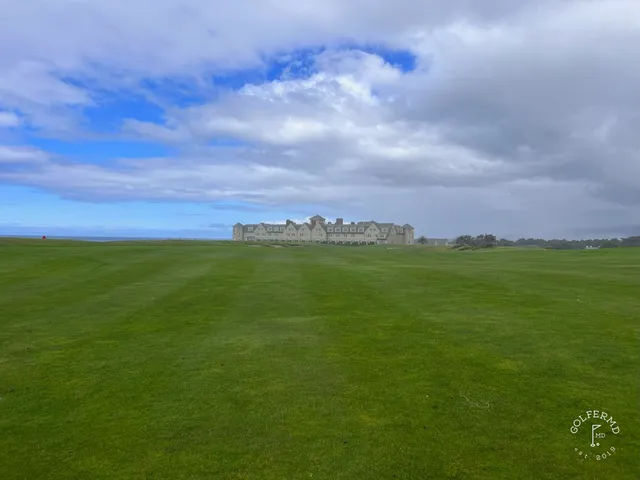A fairway toward the ocean at Half Moon Bay Golf Links Ocean Course, with a bunker on the right.
