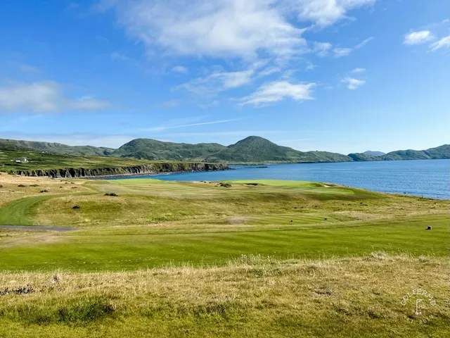 A wide view of the dunes and the water from Hogs Head.