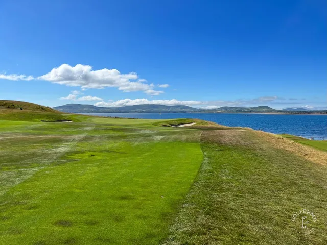 A fairway and green at Hogs Head, with a bunker in the foreground.
