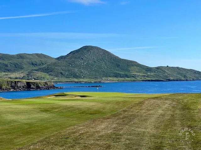 A fairway at Hogs Head, with a bunker along the hole and the ocean beyond.