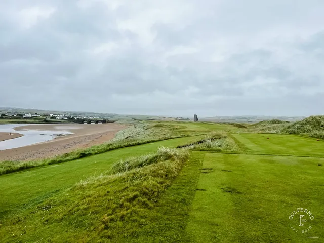 A wide hole at Lahinch, the fairway running toward the Atlantic.