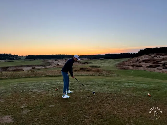 A fairway at Mammoth Dunes running through the sand hills, with fescue along the hole.