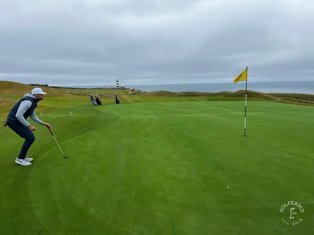 A wide view across the Old Head of Kinsale, with the course on the cliffs.