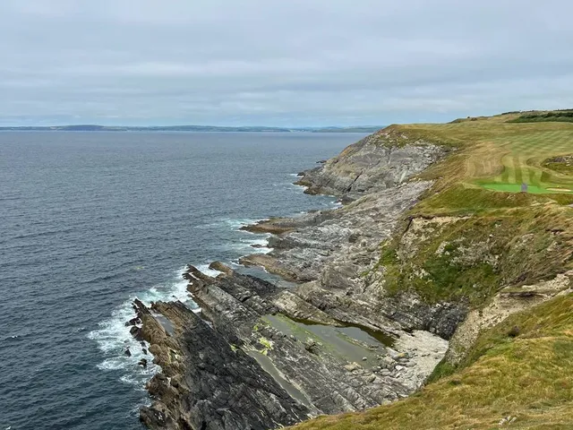 A wide view of the course and the headland at Old Head.