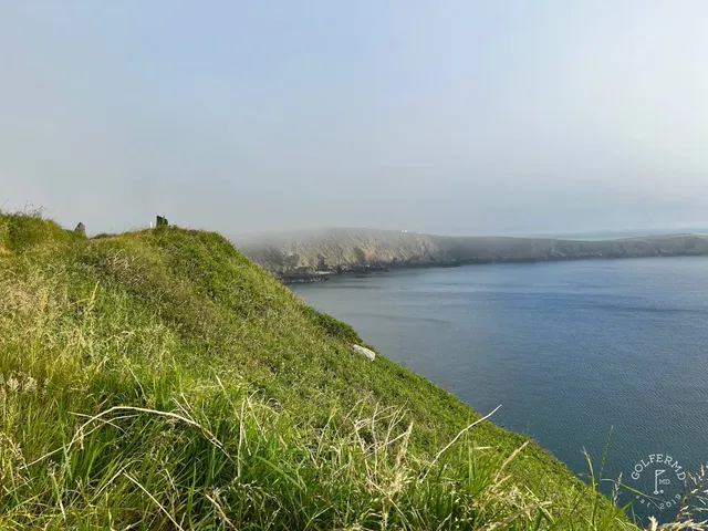 The rocks and the Atlantic from the edge of a hole at Old Head.