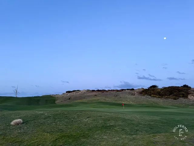 A green at Old Macdonald on the edge of the dunes, the flagstick against the Pacific.