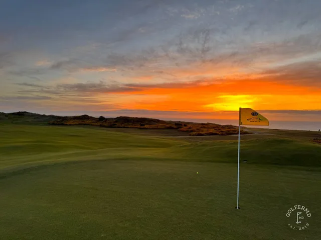 A wide hole at Pacific Dunes, the fairway running toward the Pacific.