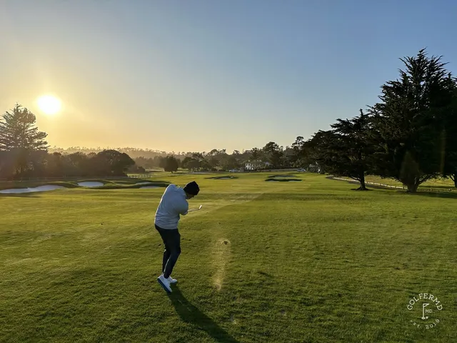 A golfer hitting a fairway shot at Pebble Beach Golf Links, with the ocean in the background.