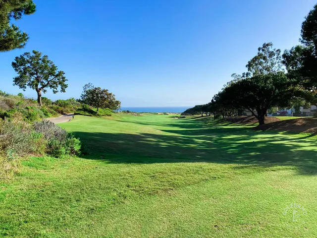 Looking down a fairway toward the ocean at Pelican Hill Ocean South Course.