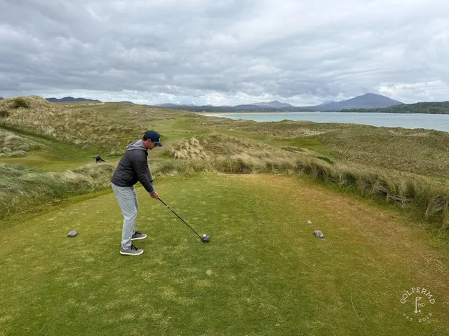 A wide view of St. Patrick's, with the dunes and Sheephaven Bay.