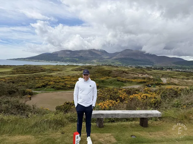 A green on the Annesley Links above the dunes, the flagstick against the Mournes.