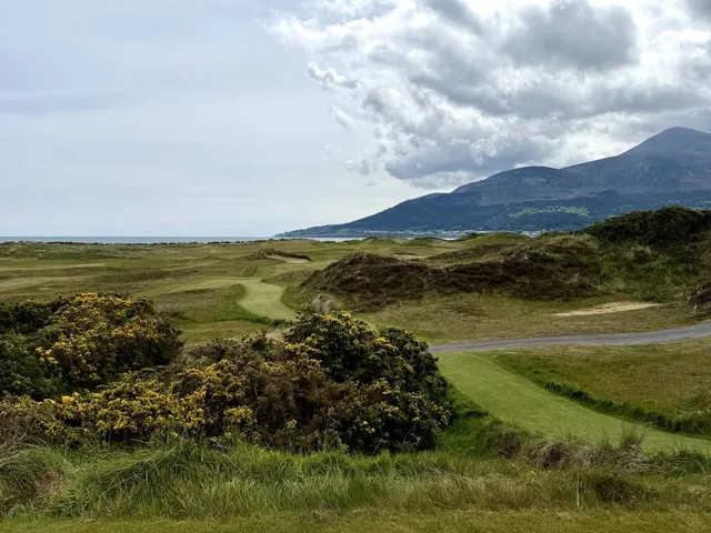 The dunes and the Mourne Mountains from a tee at Royal County Down.