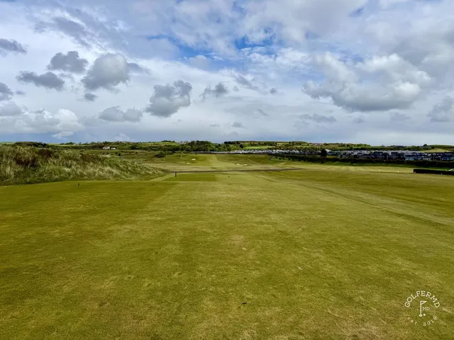 A fairway at Royal Portrush running through the dunes toward the Atlantic.
