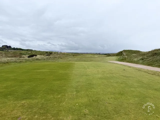 The dunes and the Atlantic from a tee at Royal Portrush.