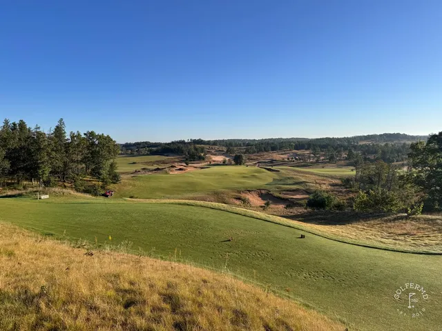 A last wide view across Sand Valley, with the sand hills and the fairway.