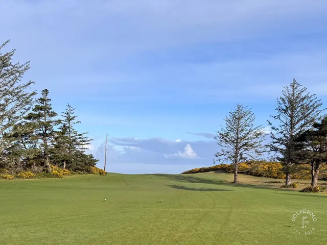 A wide panorama of Sheep Ranch, several holes on the headland and the ocean beyond.