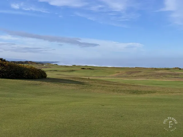 A fairway at Sheep Ranch with a bunker on the right and the Pacific ahead.