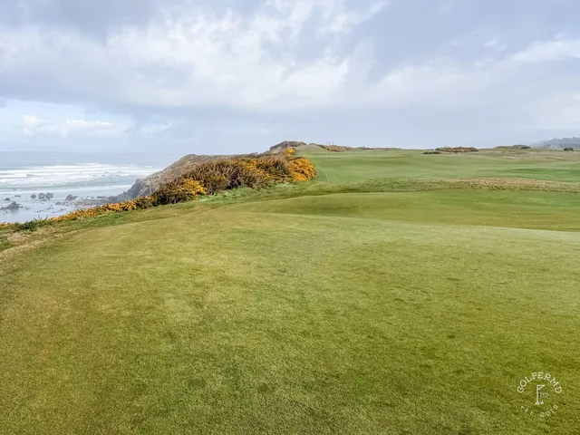 A fairway at Sheep Ranch running along the dune edge, with the green in the distance.