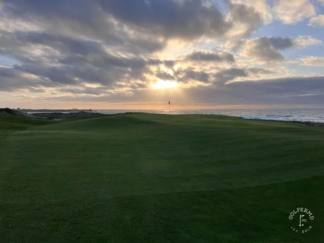 The dunes, cypress trees, and the ocean at The Links at Spanish Bay.