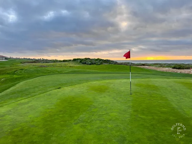 A wide view of the dunes and the ocean at The Links at Spanish Bay.