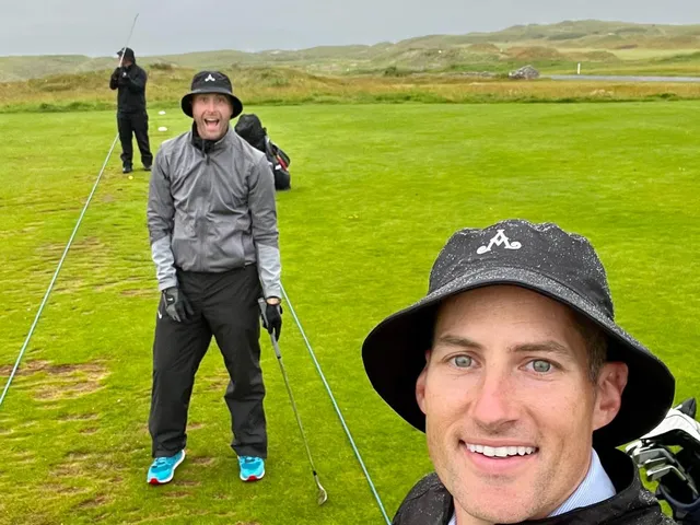 A fairway at Tralee Golf Club running through the dunes toward the Atlantic.