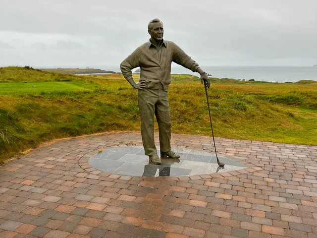 A tee at Tralee looking down a fairway lined with dunes.