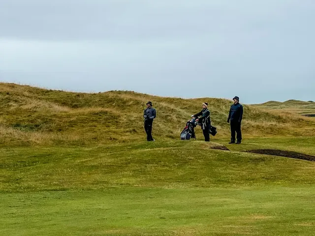 The beach and the links at Tralee, with the dunes along the shore.
