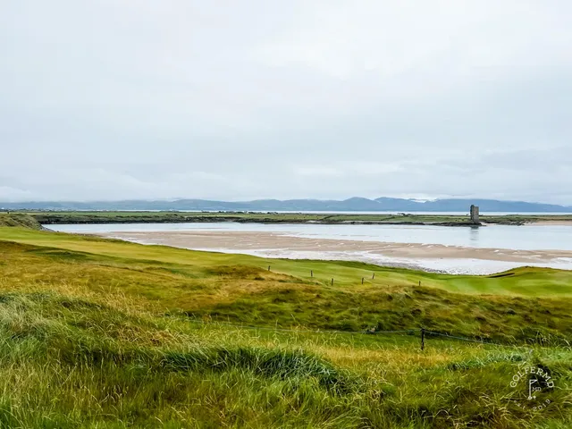 A fairway at Tralee running along the dunes, with the green in the distance.