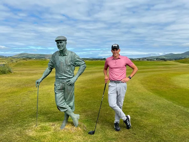 A tee at Waterville looking down a fairway lined with dunes.