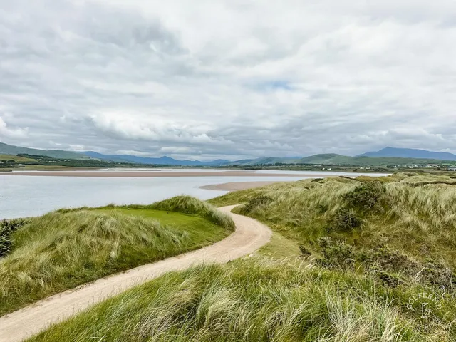 The beach and the links at Waterville, with the mountains across the bay.