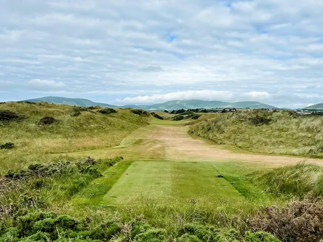 A fairway at Waterville from the tee, bunkers on both sides and the ocean ahead.