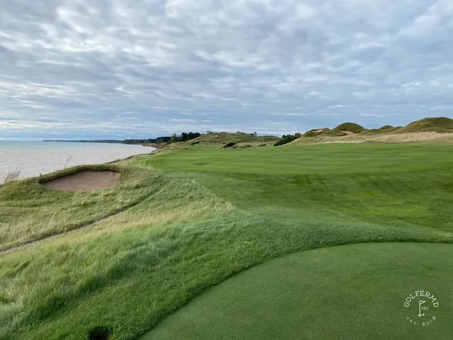 The dunes on the Straits Course, with the shore and the lake on the horizon.