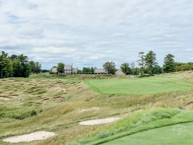 A last rise on the Straits Course, looking down a fairway to the lake.